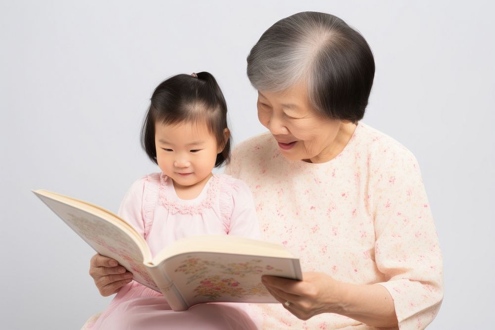 Reading child grandmother publication. AI generated Image by rawpixel.