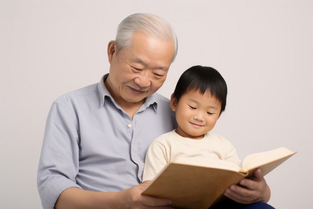 Reading grandfather publication child. 