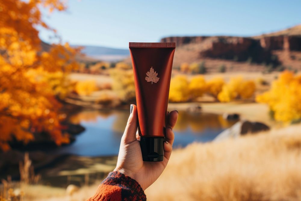 Cosmetics holding autumn person. AI generated Image by rawpixel.