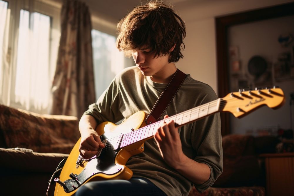 Musician guitar teen entertainment. AI generated Image by rawpixel.