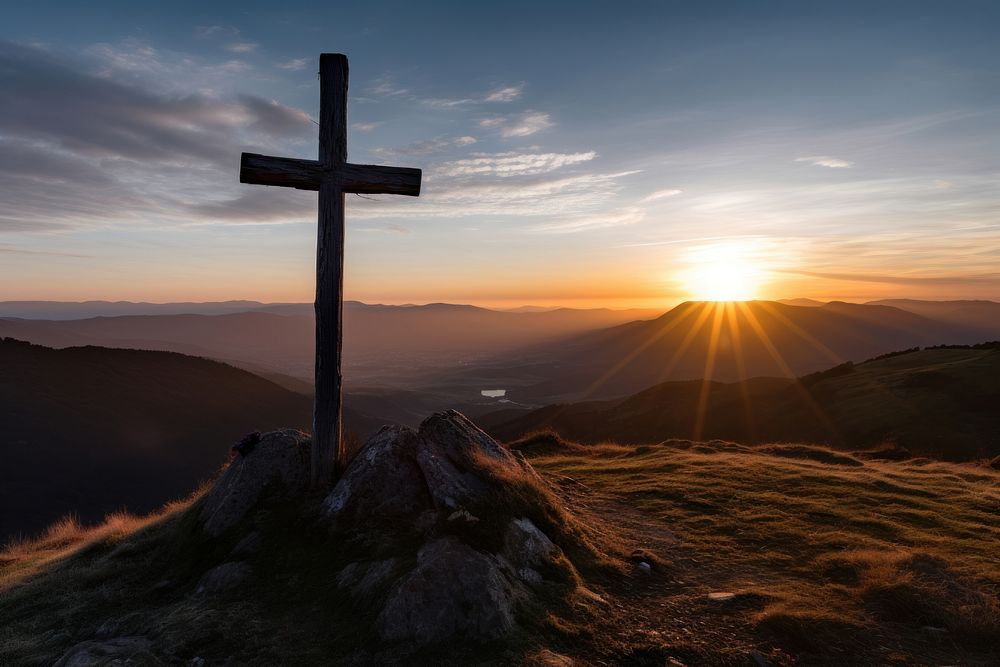 Cross mountain sunlight outdoors. 