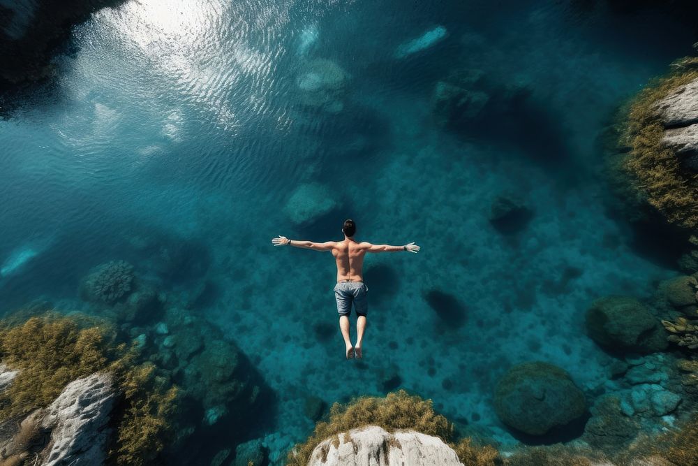 Swimming outdoors jumping nature. 