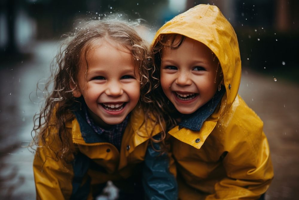 Portrait raincoat child smile. 