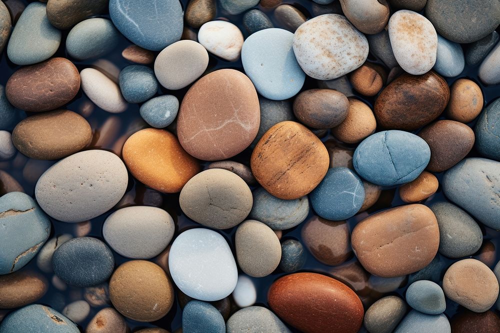 Pebble stone beach pill. AI generated Image by rawpixel.