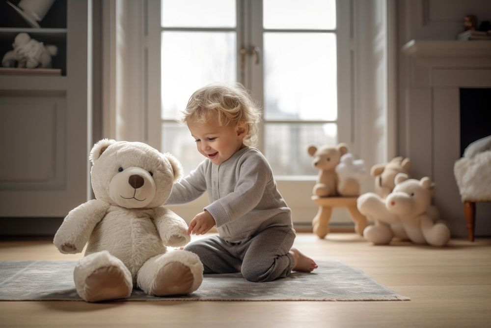 Baby toy sitting white. 