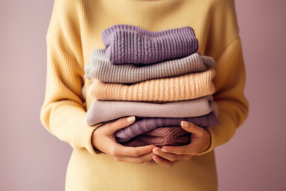 Sweater holding midsection outerwear. AI generated Image by rawpixel.