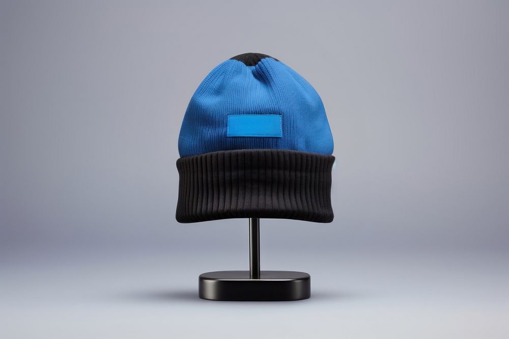 Beanie hat furniture headgear. AI generated Image by rawpixel.