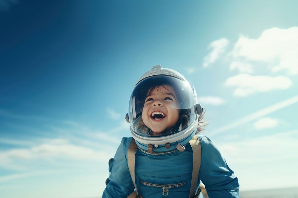 Astronaut smiling helmet child. AI generated Image by rawpixel.