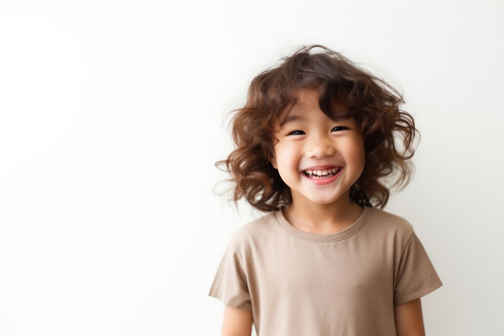 Child laughing portrait smiling. AI generated Image by rawpixel.