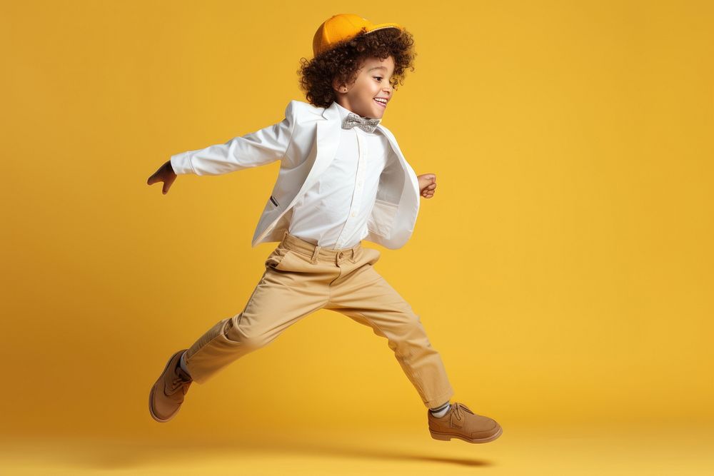 Dancing jumping child boy. AI generated Image by rawpixel.