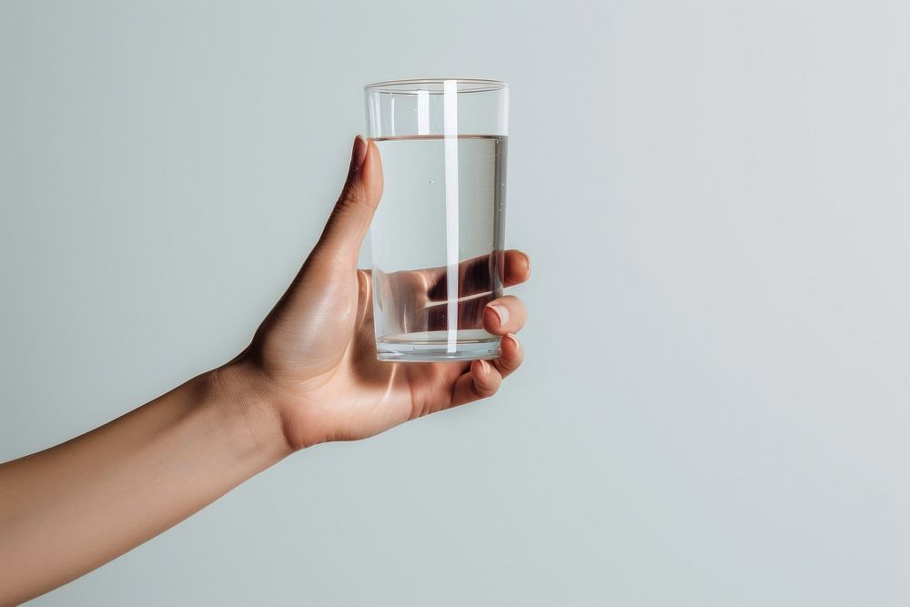 Glass holding hand transparent. AI generated Image by rawpixel.
