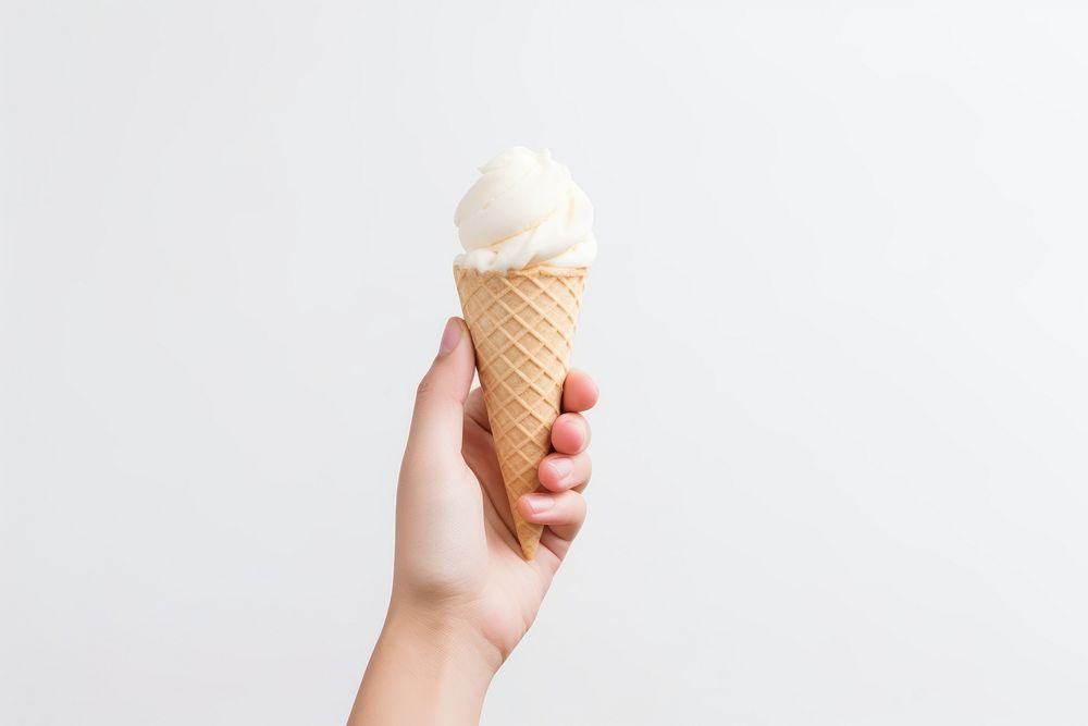 Dessert cream food hand. AI generated Image by rawpixel.