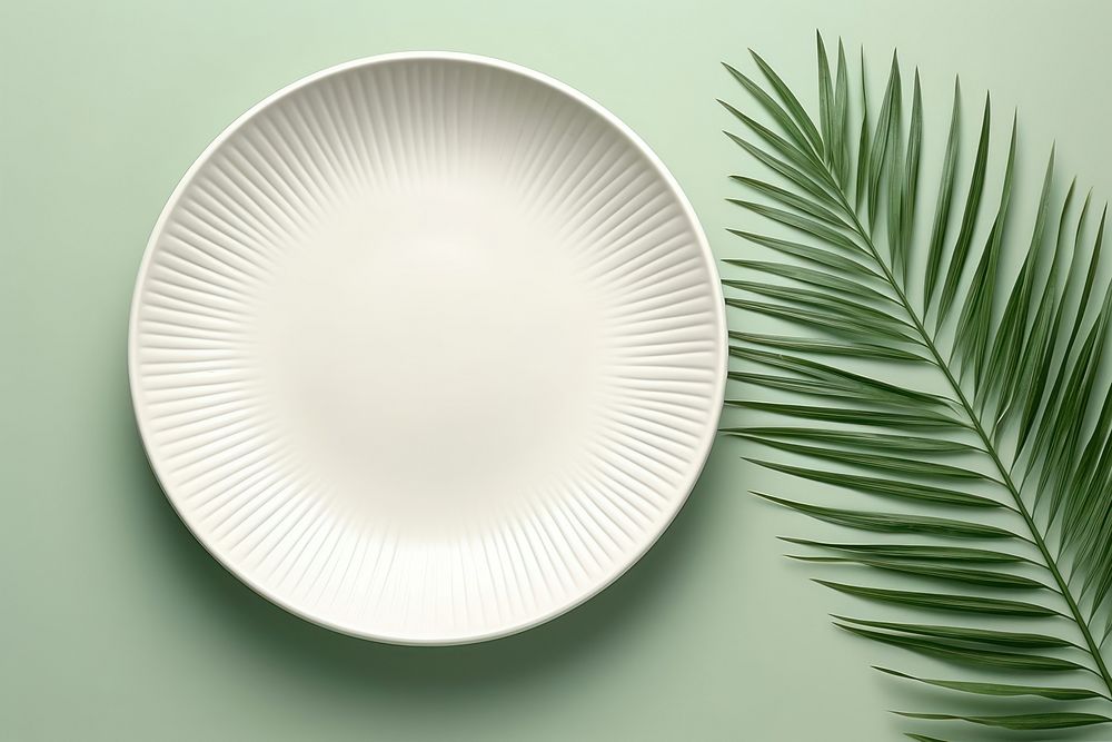 Porcelain platter plate plant. AI generated Image by rawpixel.