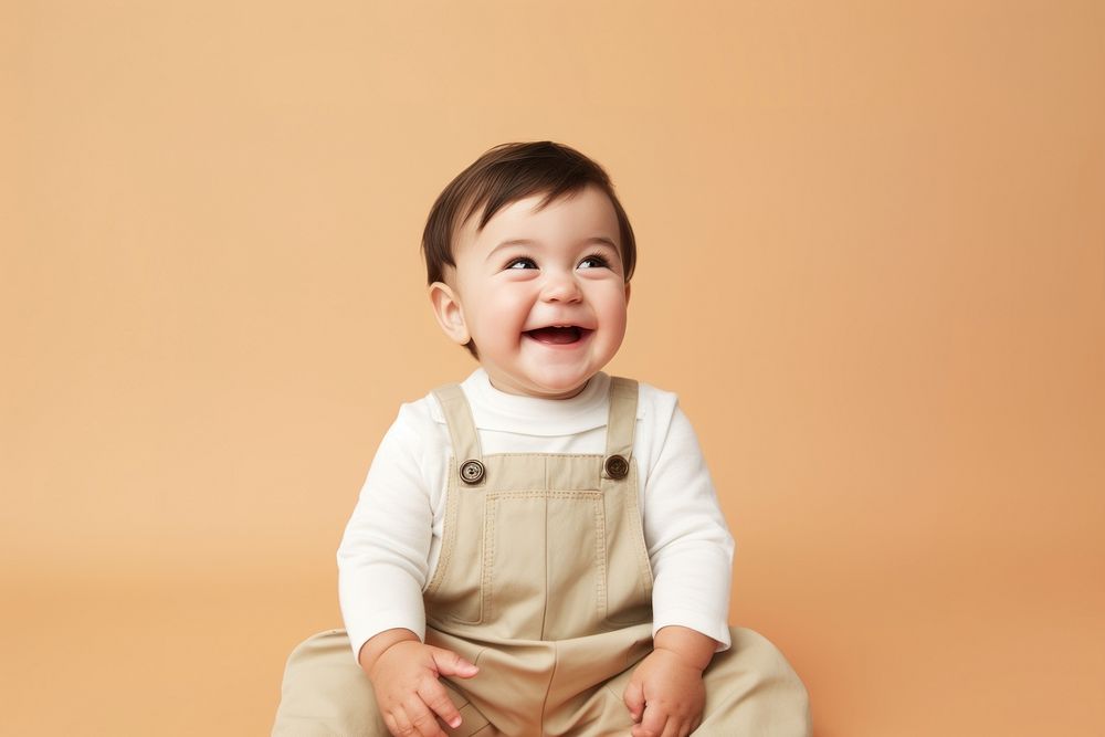 Sitting smile happy baby. AI generated Image by rawpixel.