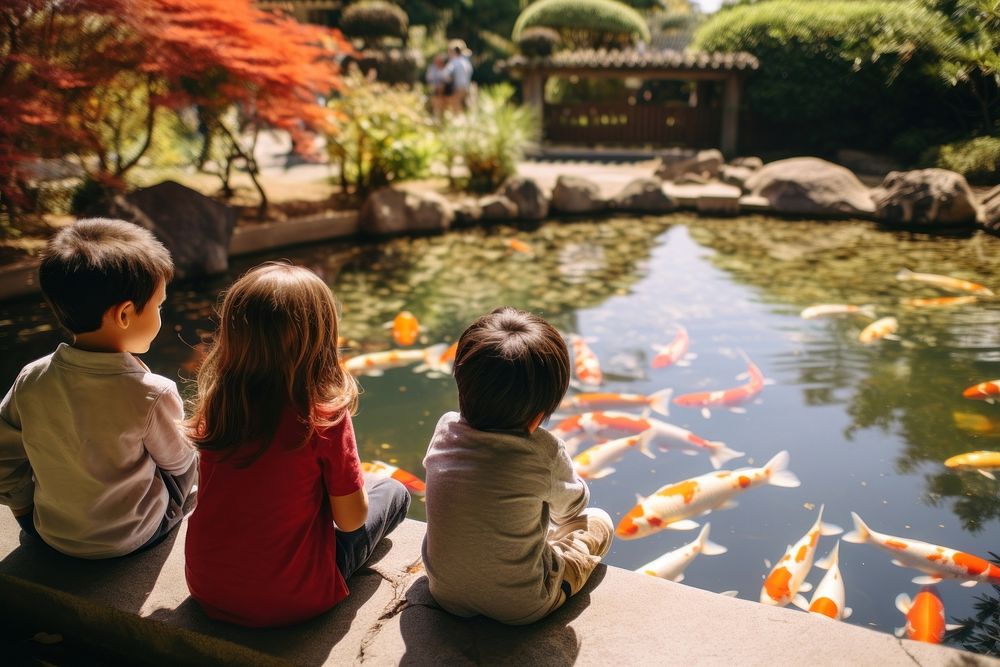 Child pond koi photography. AI generated Image by rawpixel.