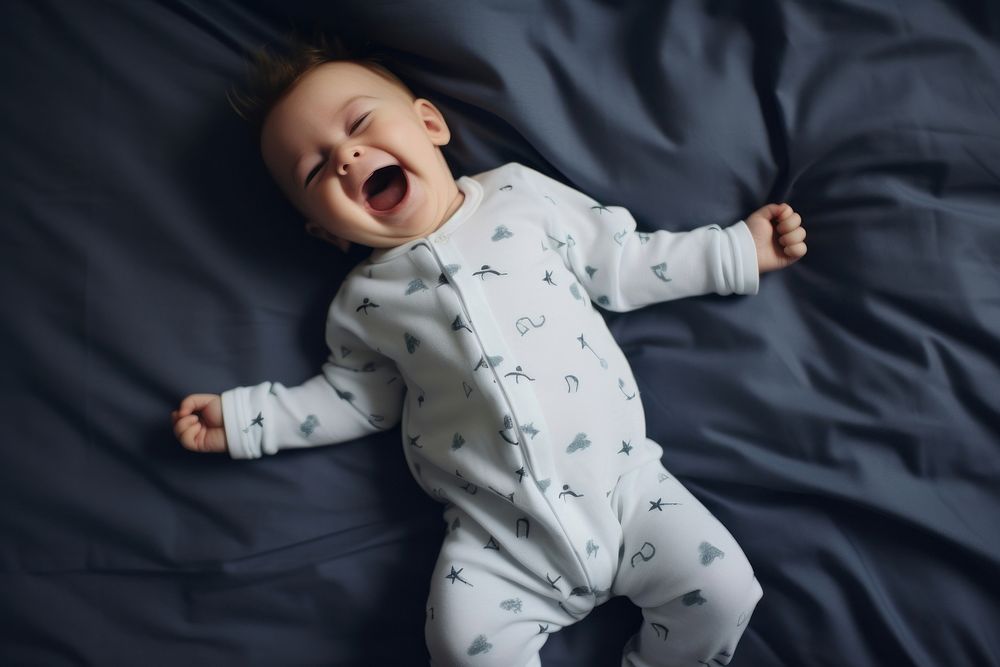 Baby laughing yawning bed. AI generated Image by rawpixel.