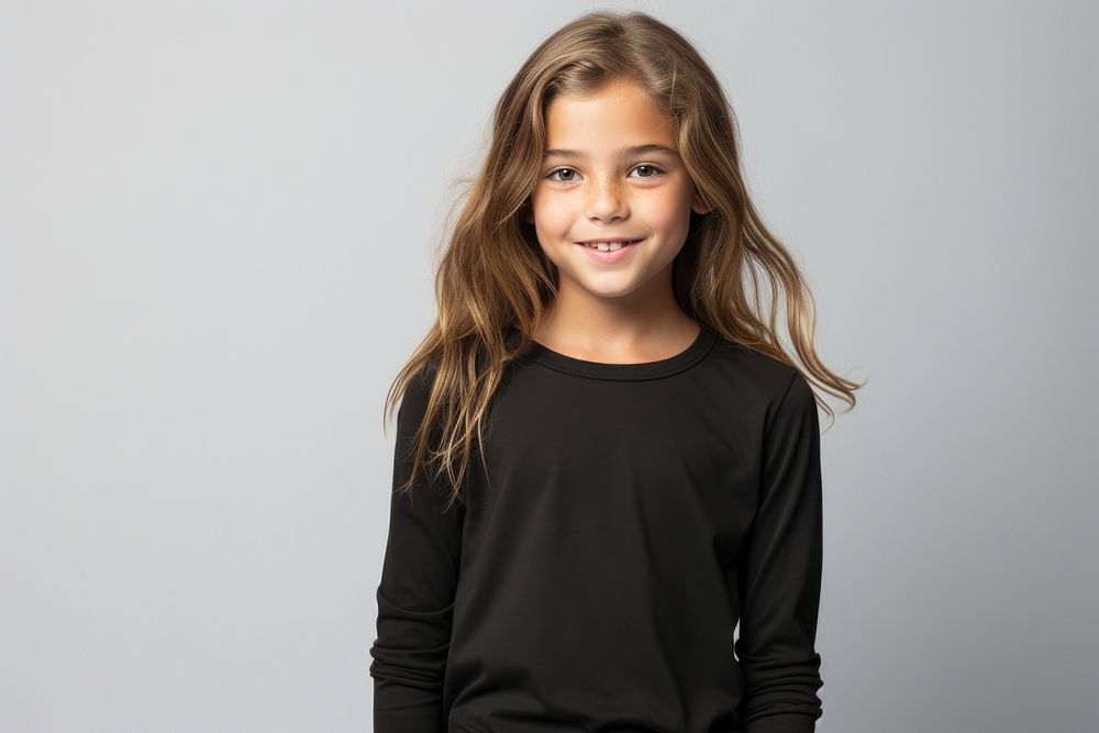 A girl smiling wearing a black long sleeve T-shirt portrait t-shirt smile. AI generated Image by rawpixel.