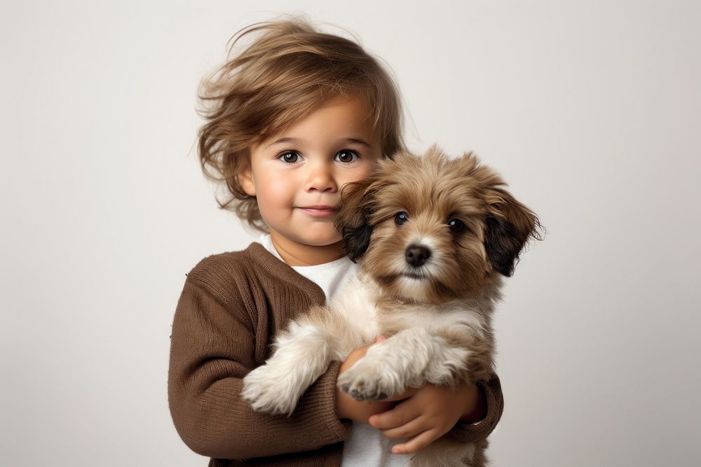 Portrait puppy toddler holding. AI generated Image by rawpixel.