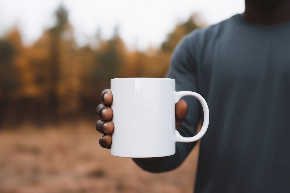 Mug holding coffee. 