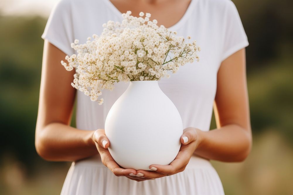 White flower vase  outdoors wedding. AI generated Image by rawpixel.