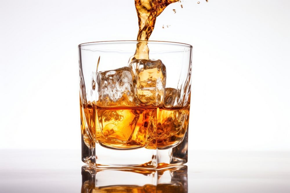 Glass whiskey pouring whisky. AI generated Image by rawpixel.