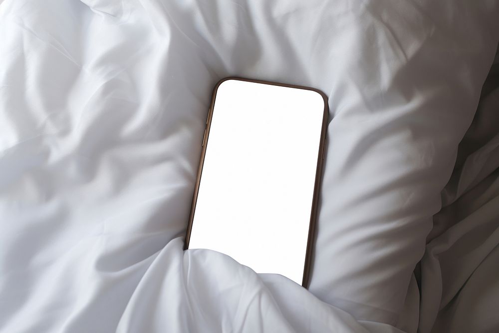 Blanket pillow sheet phone. AI generated Image by rawpixel.