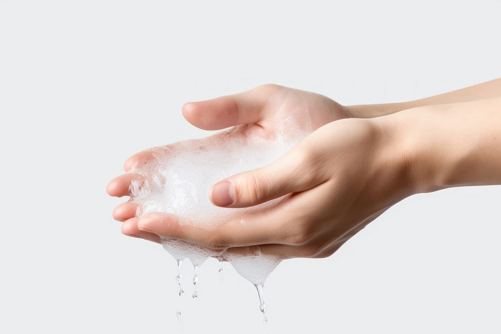 Hand washing white background splashing cleaning. 