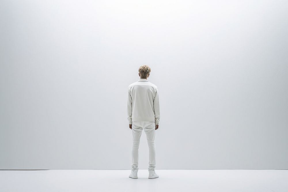 Standing adult white outerwear. AI generated Image by rawpixel.