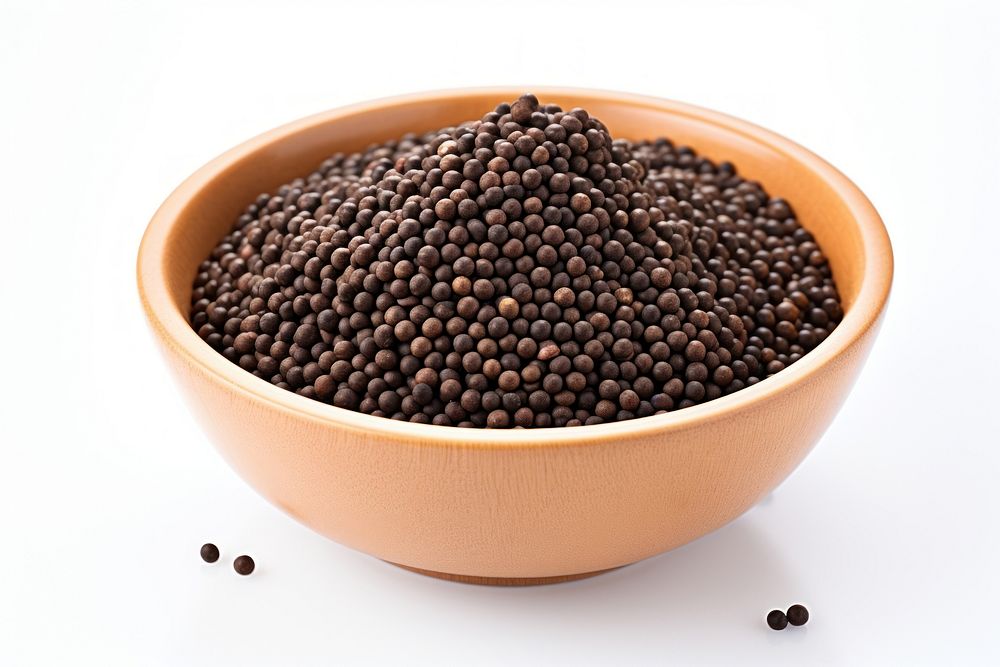 Black mustard seeds food bowl white background. AI generated Image by rawpixel.