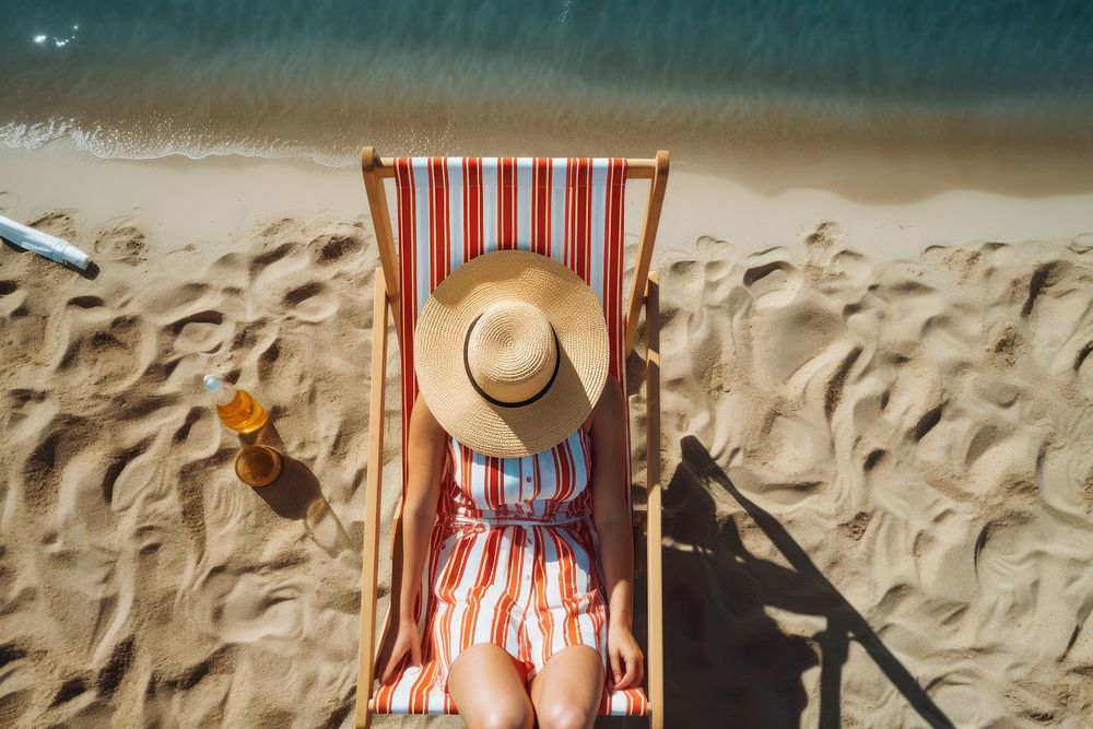 Beach sunbathing outdoors nature. AI generated Image by rawpixel.