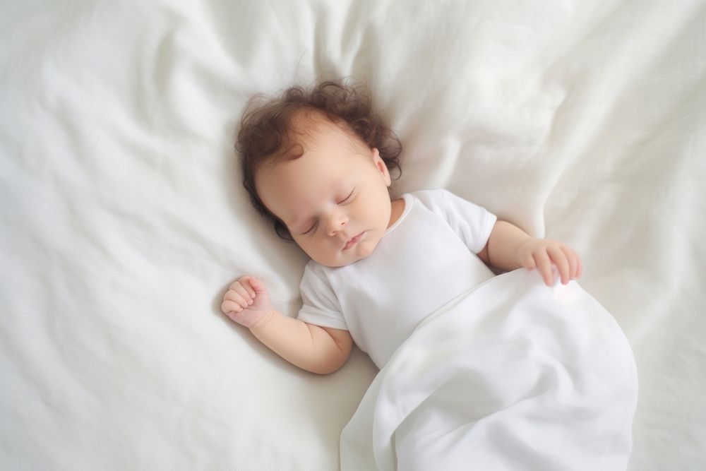 Sleeping blanket baby portrait. 