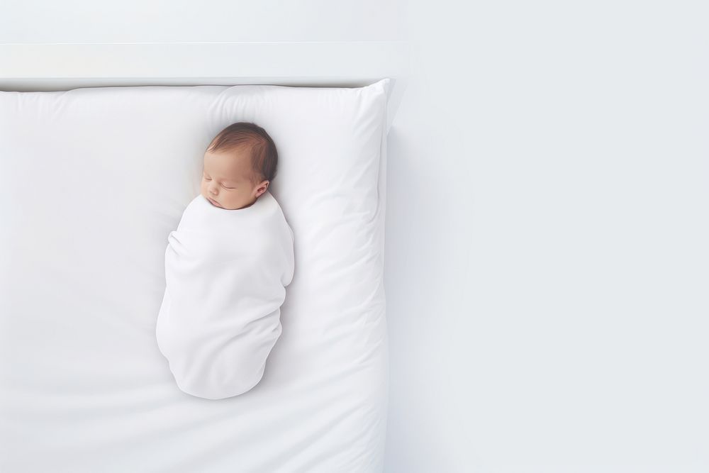 Blanket baby sleeping white. 