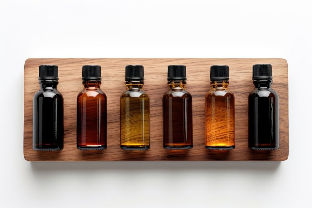 Bottle seasoning perfume wood. AI generated Image by rawpixel.
