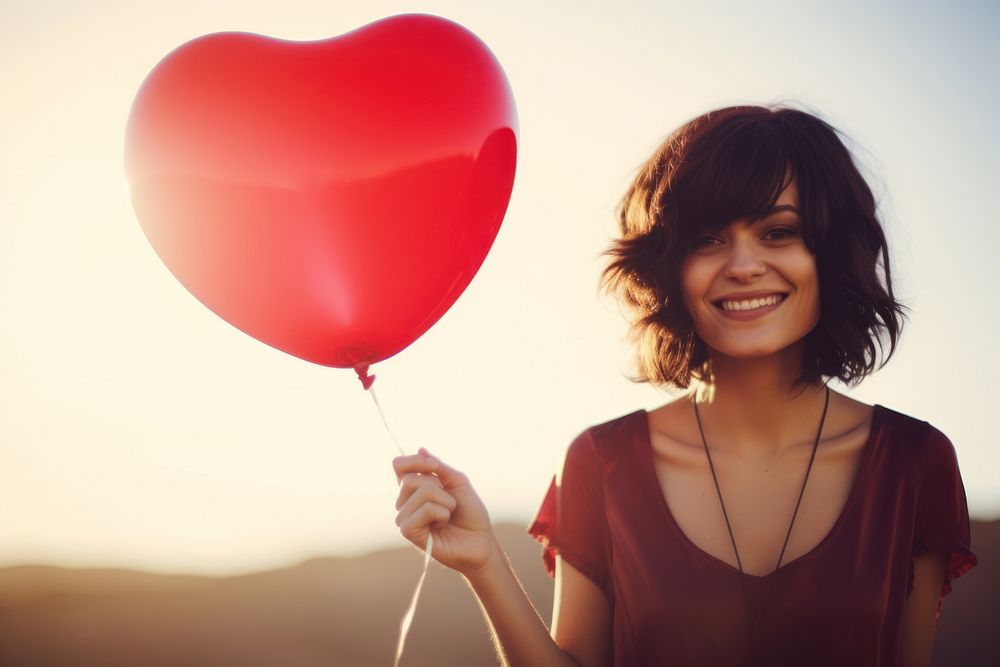 Love balloon smiling holding. 