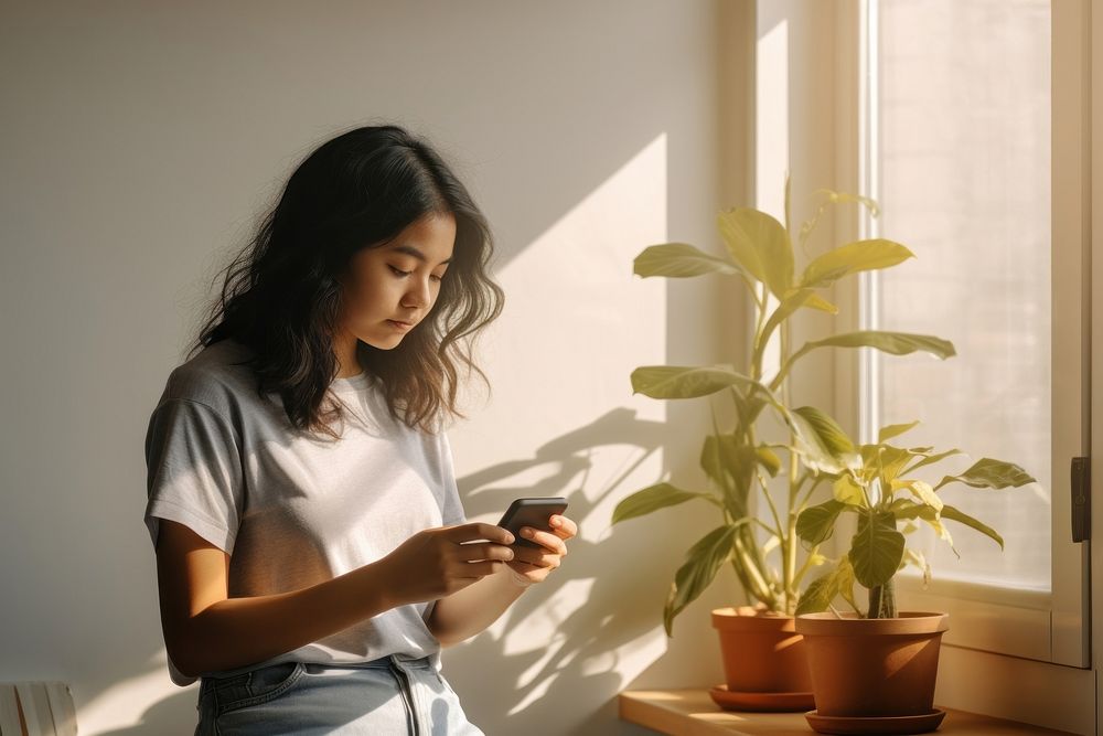 Plant phone teen contemplation. AI generated Image by rawpixel.