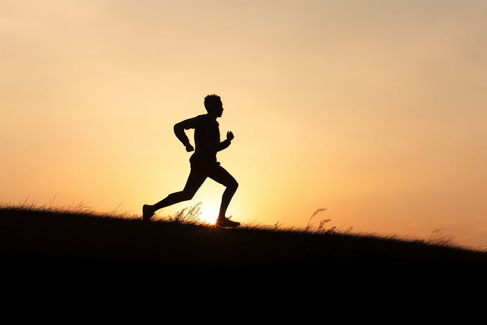 Backlighting silhouette running jogging. 