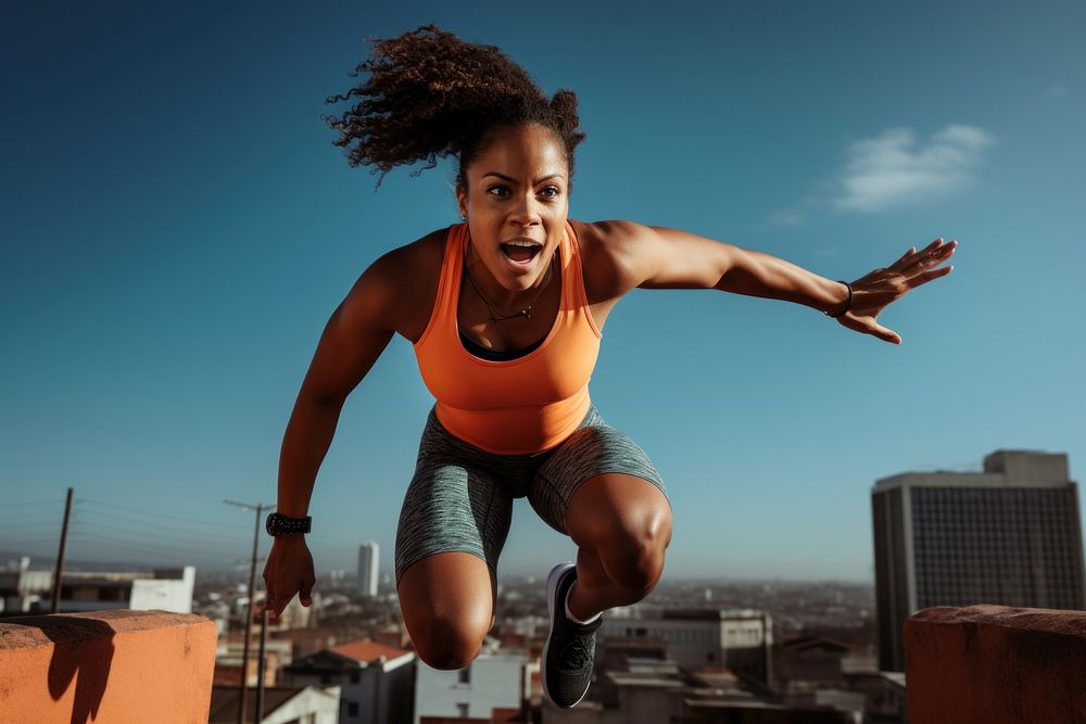 Jumping adult woman determination. AI generated Image by rawpixel.