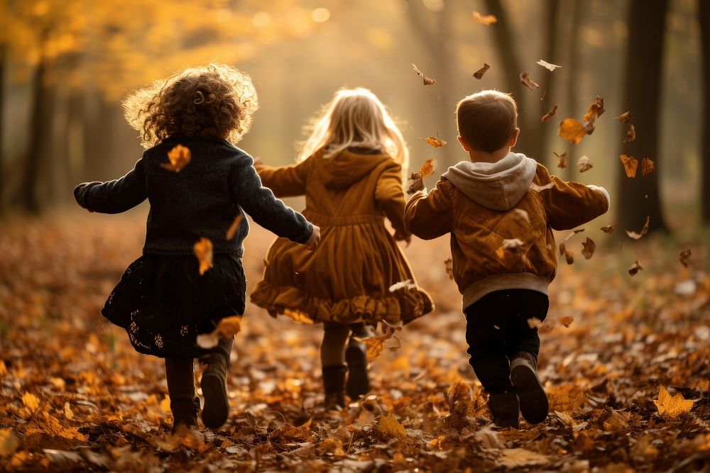 Autumn child walking leaves. AI generated Image by rawpixel.