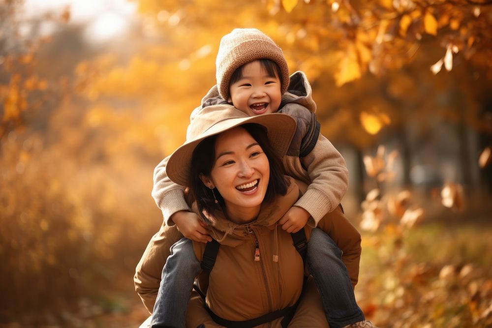 Laughing autumn child adult. AI generated Image by rawpixel.