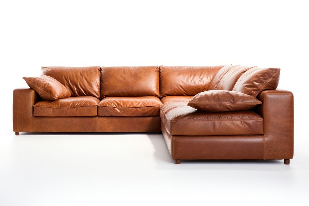 Sectional leather sofa furniture cushion white background. AI generated Image by rawpixel.