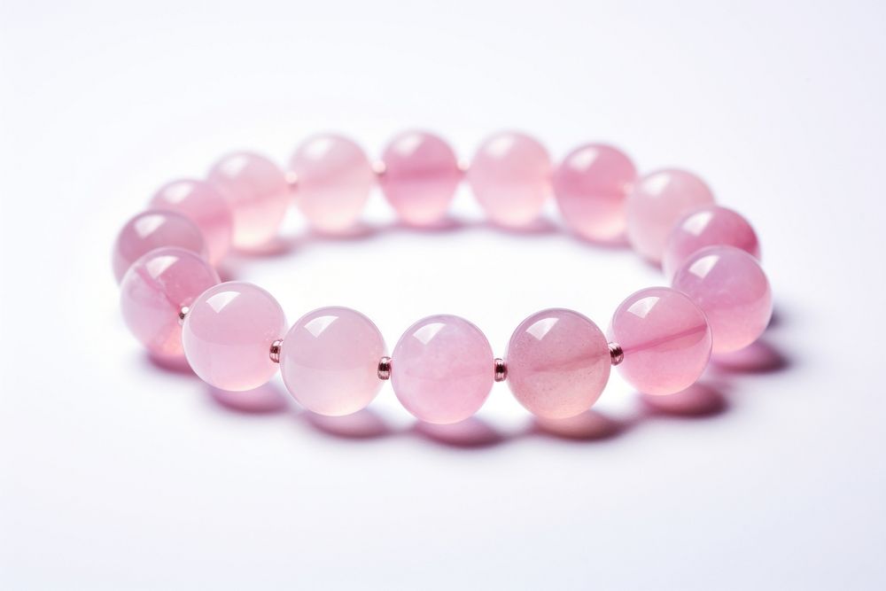 Rose quartz bracelet jewelry pill white background. AI generated Image by rawpixel.
