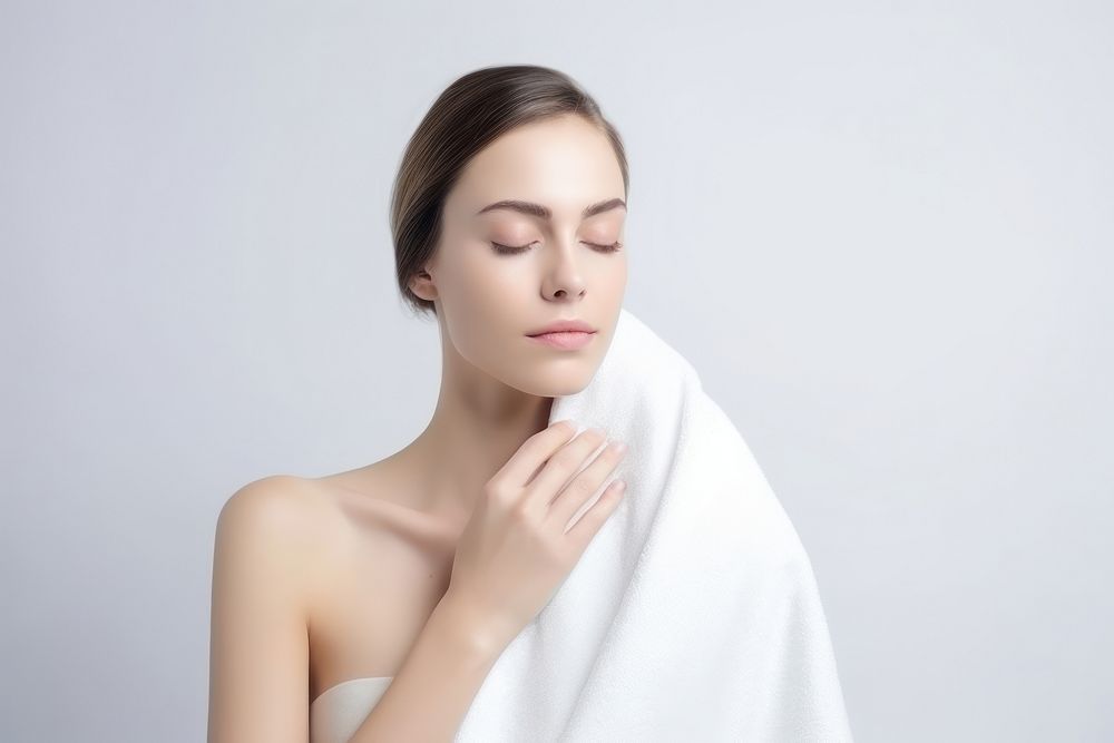 Woman using a towel adult white contemplation. AI generated Image by rawpixel.