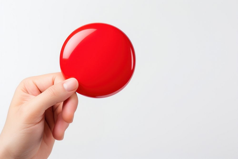 Hand white background holding balloon. 