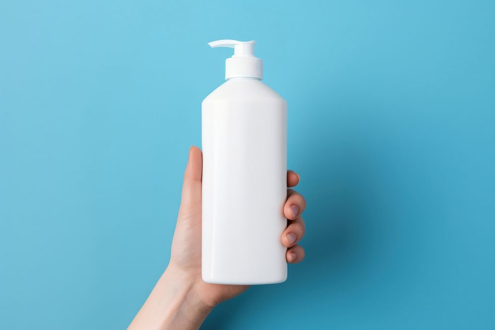 Bottle holding lotion blue. AI generated Image by rawpixel.