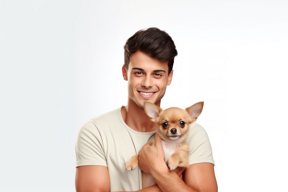 Happy young man holding dog chihuahua portrait mammal. AI generated Image by rawpixel.