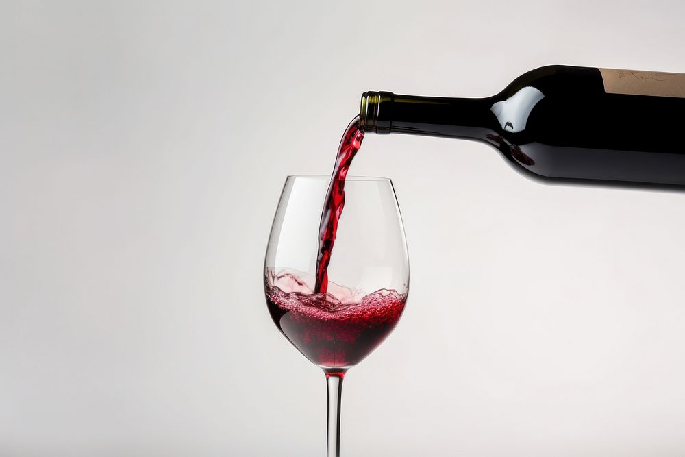 Bottle glass wine pouring. AI generated Image by rawpixel.