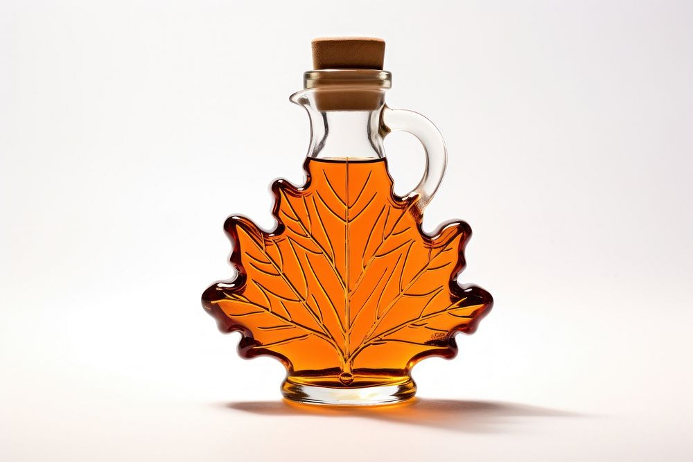 Maple syrup bottle plant leaf. AI generated Image by rawpixel.