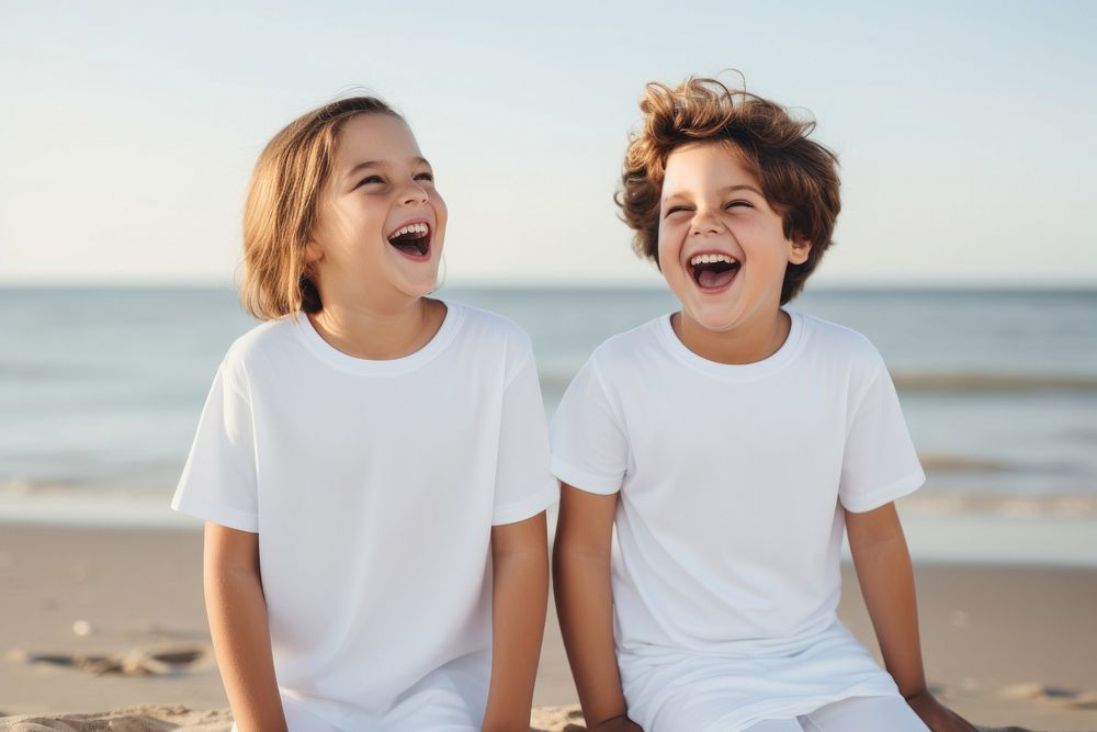 Laughing beach happy togetherness. 