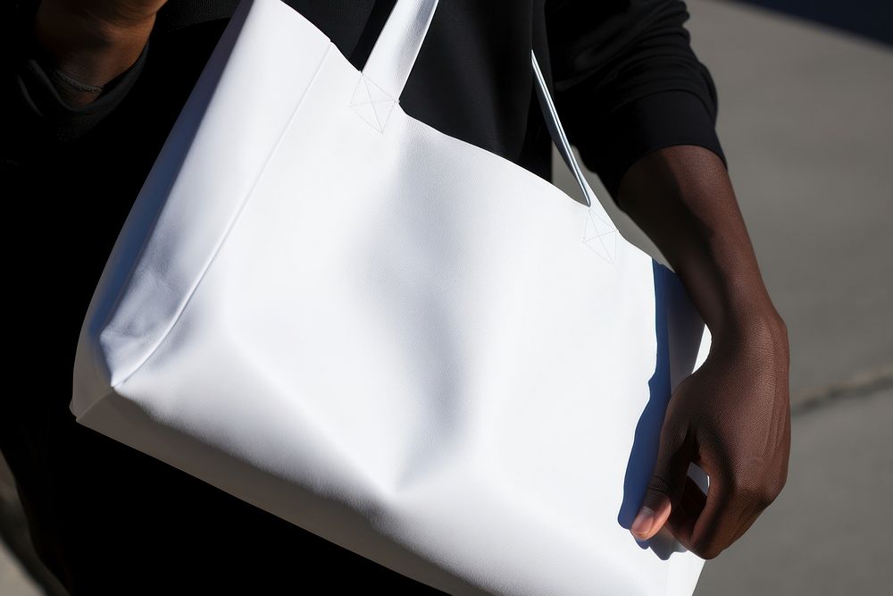 Bag handbag white black. AI generated Image by rawpixel.