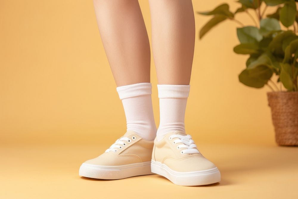 Sock footwear white plant. AI generated Image by rawpixel.